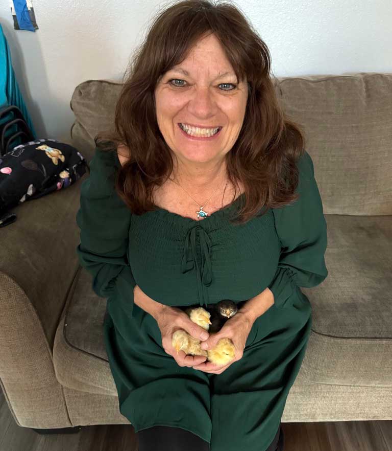 Mary Gregory Holding Bavy Chicks