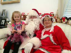 Gigi with Santa and Mrs Claus