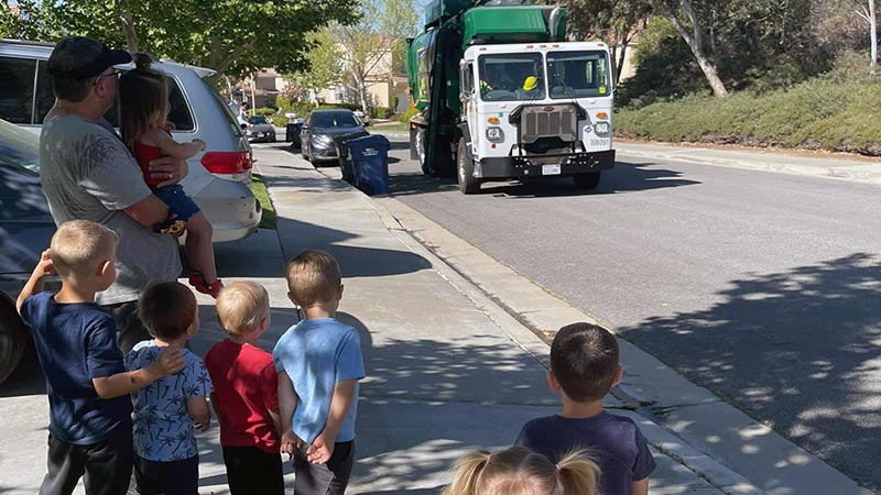 Kids Watching Trash Truck